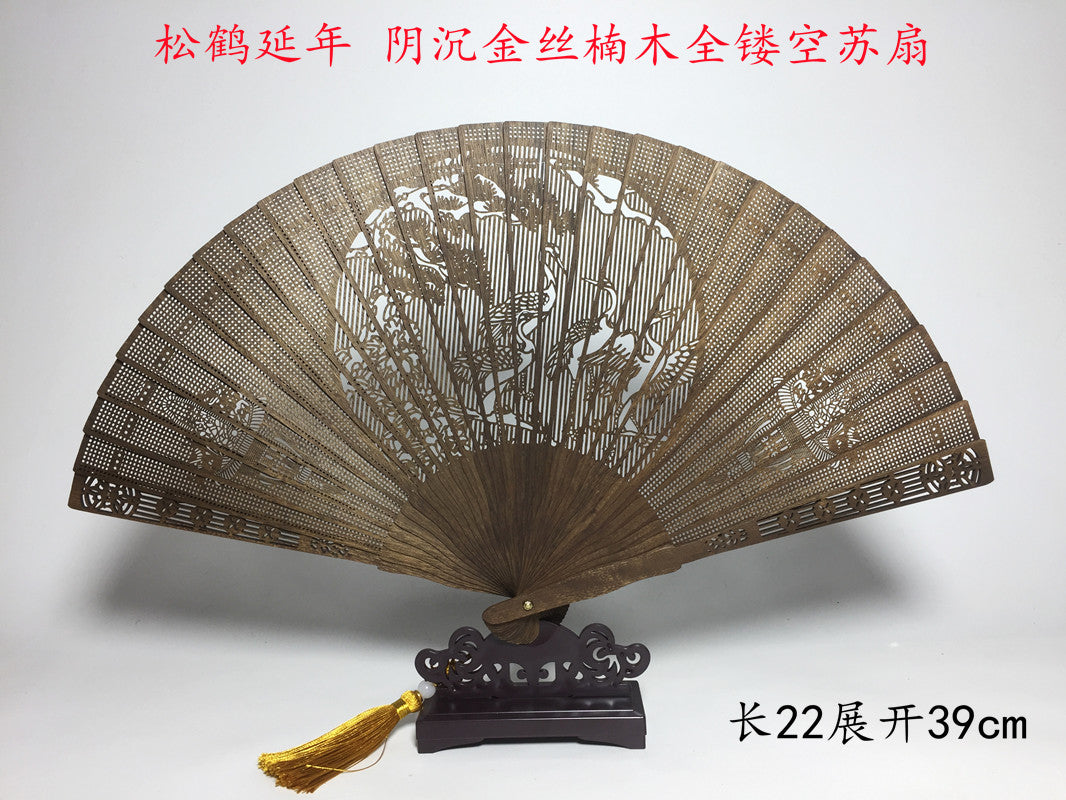 Golden nanmu fan Xiaoye Zhennan old material Su fan Jinsi nan fan hollowed out ancient style traditional solid wood China